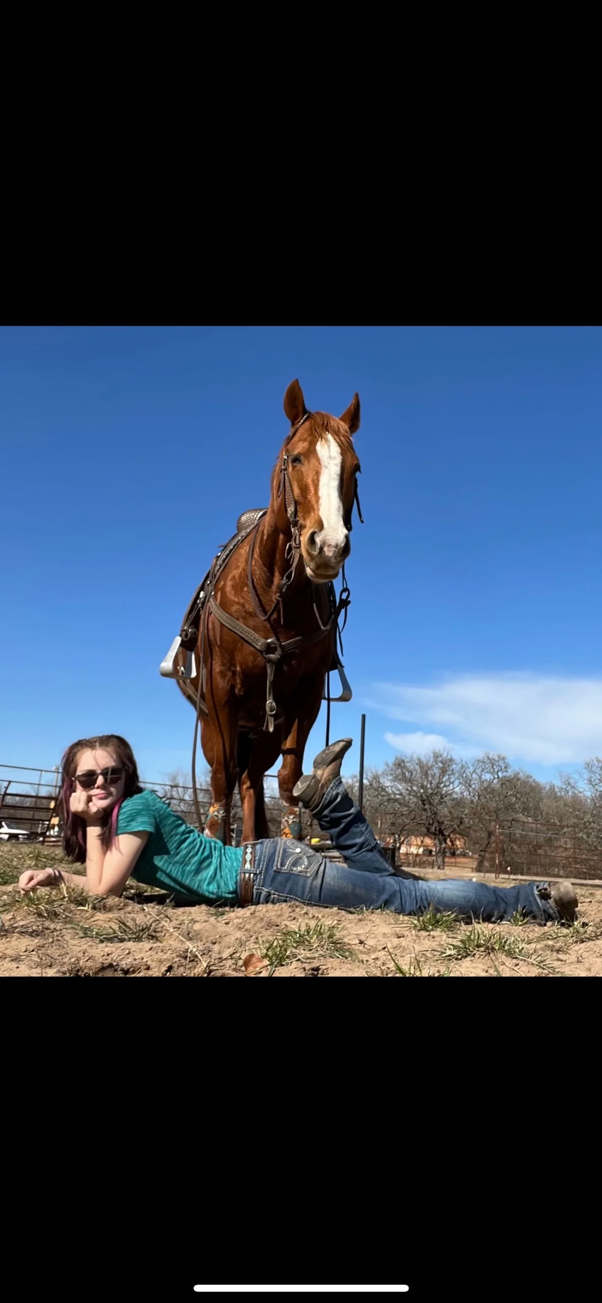 Kay Warner's older daughter, Dallas, sits beside Countin Bingo Checks.
