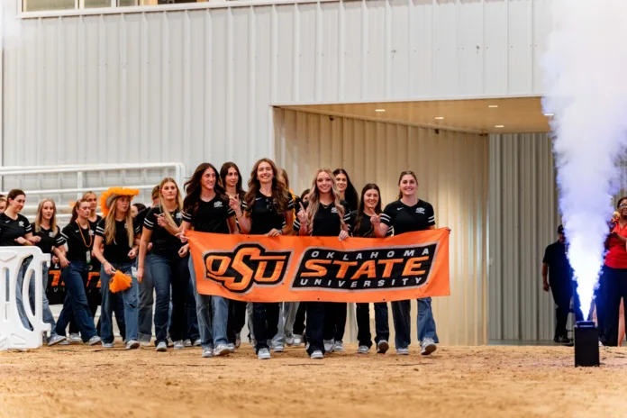 Photo 2 champ pic banner The OSU Cowgirl Equestrian Team celebrates its 2026 Big 12 Championship victory.