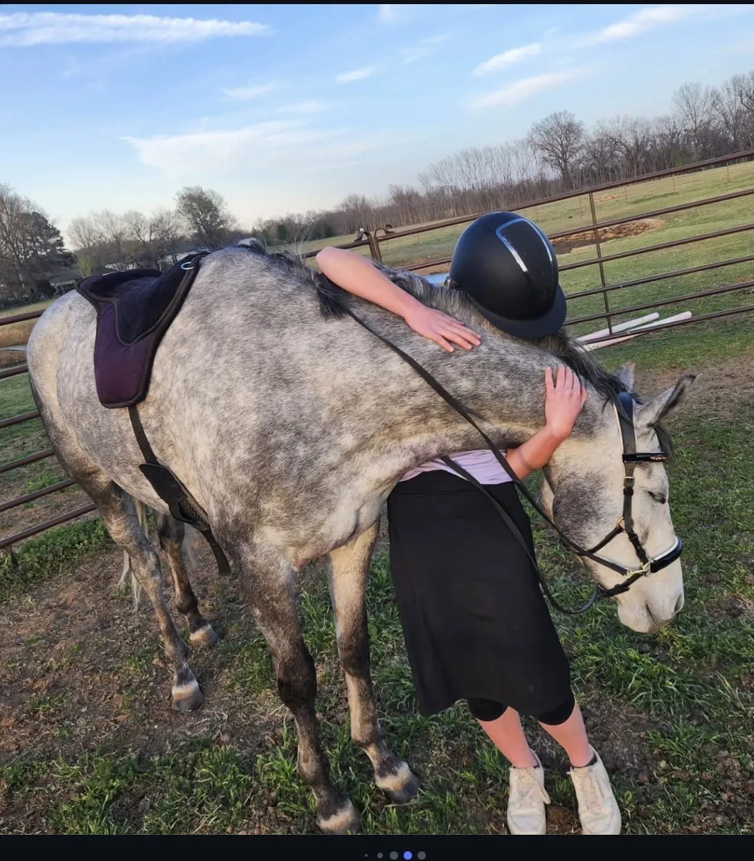 Emily with her new horse, Legacy (Holy Ama), a 5-year-old thoroughbred fresh off the racetrack. Emily plans to restart the horse and eventually compete in hunter jumper.