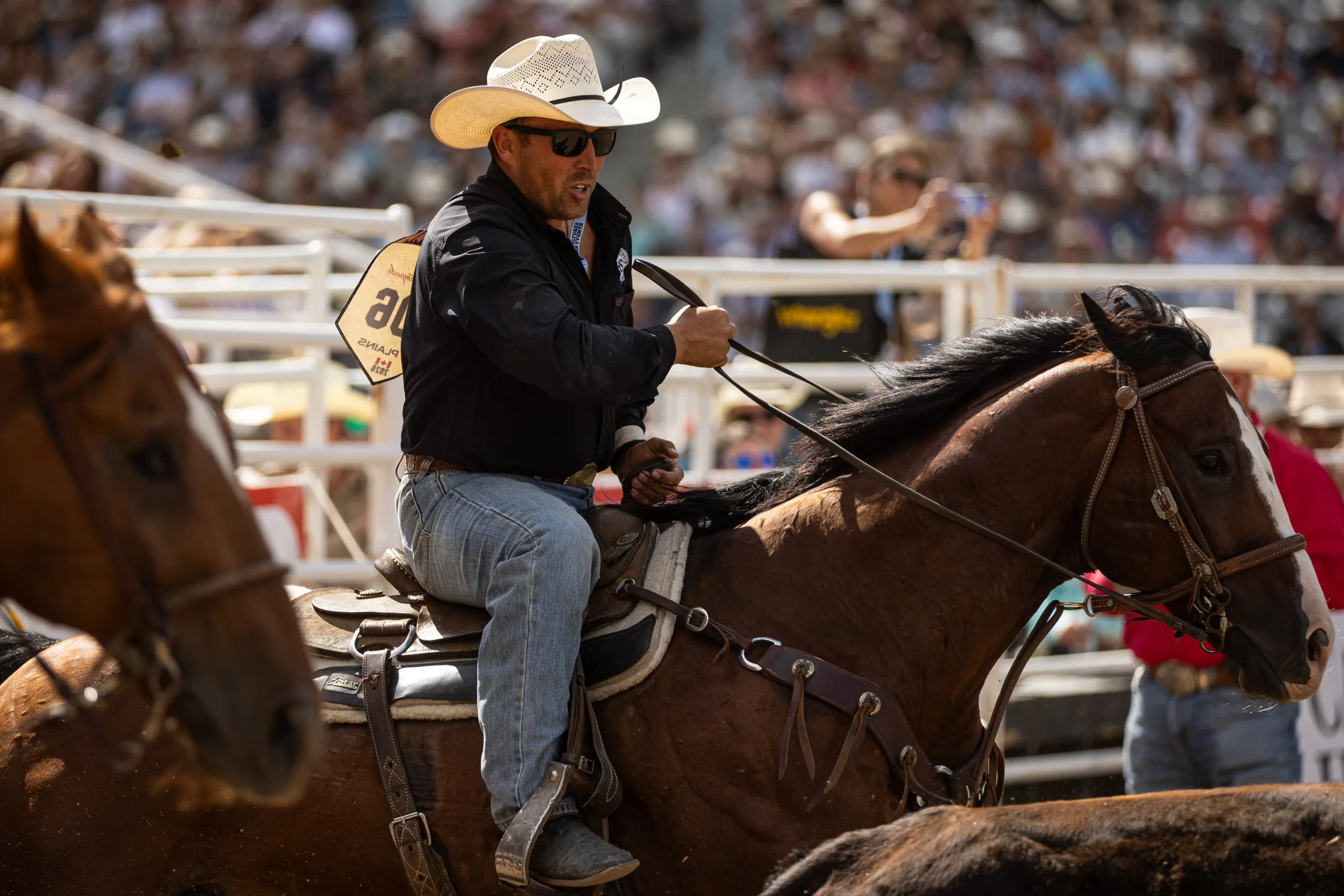 Riley Duvall on Dr. Pepper during a steer wrestling run at the Calgary Stampede.