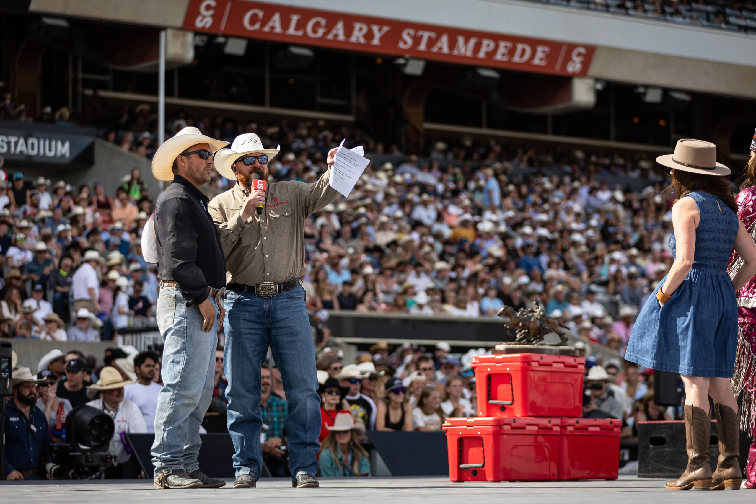 Riley Duvall is interviewed in the arena at the Calgary Stampede.