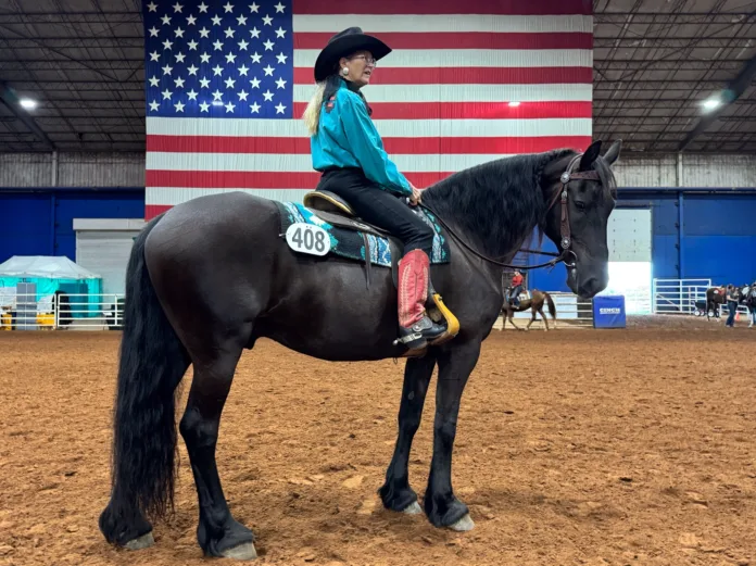 Photo 1 Inola dressage trainer Patty Couch and her Friesian gelding Gallant Prince Von G have been competing at the Championship Show since its debut. Prince earned WDAA’s Super Horse title in 2026.